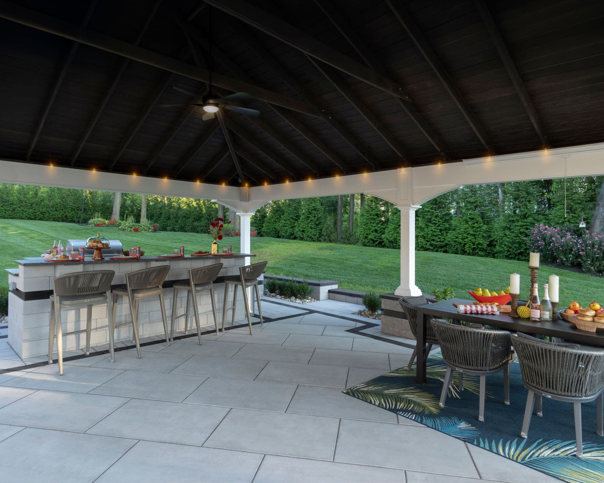 A patio with white pavers